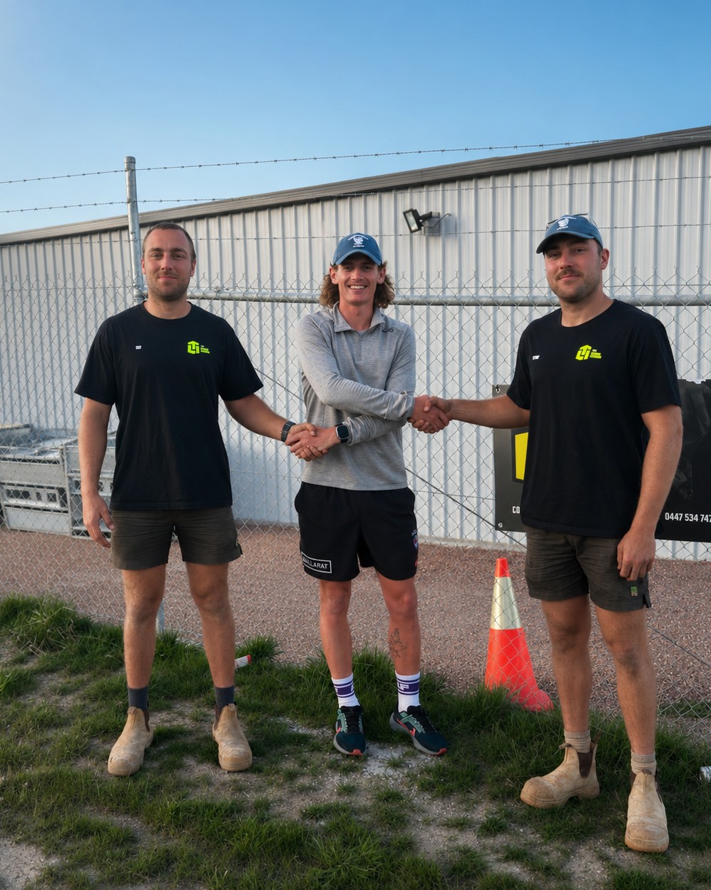The TLM Concrete Solutions team in branded shirts on site in north-west Tasmania